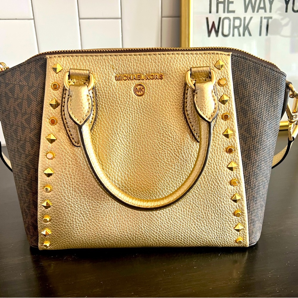 Absolutely stunning gold studded Michael Kors gold and monogram satchel.